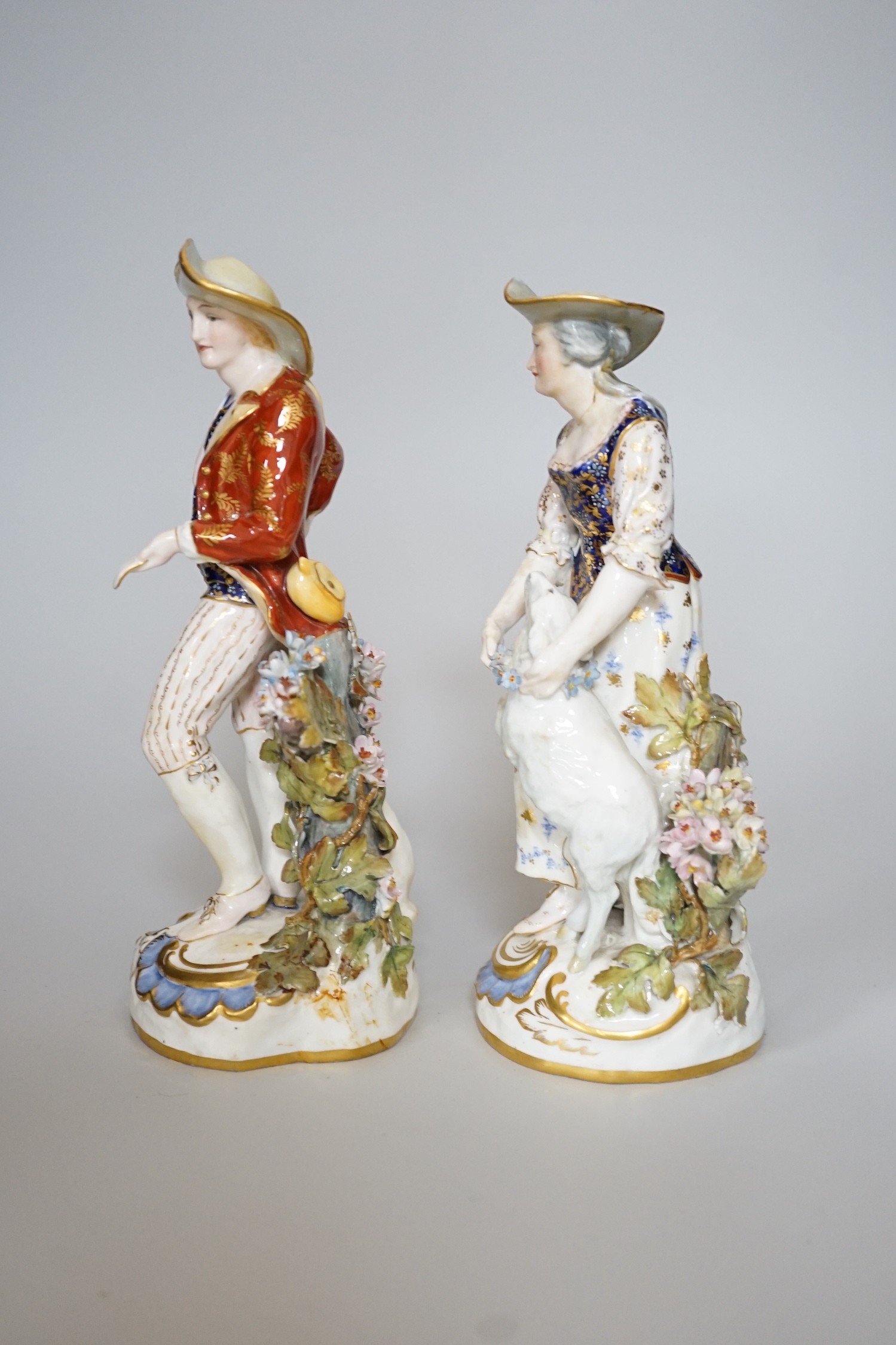 A pair of Royal Crown Derby figures of a Shepherd and shepherdess, 23cm
